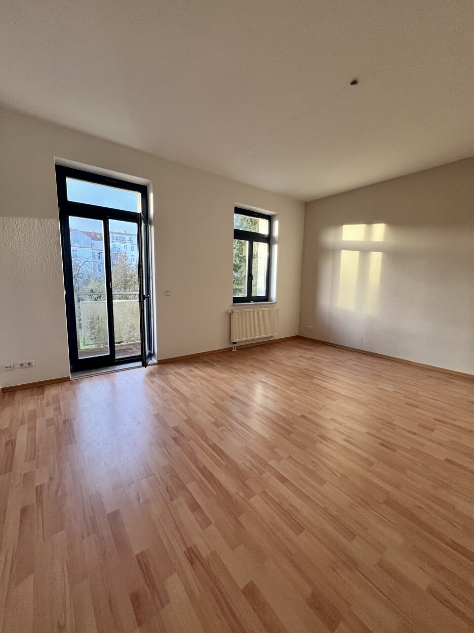 Wohnzimmer mit Balkon Wohnzimmer mit Balkon